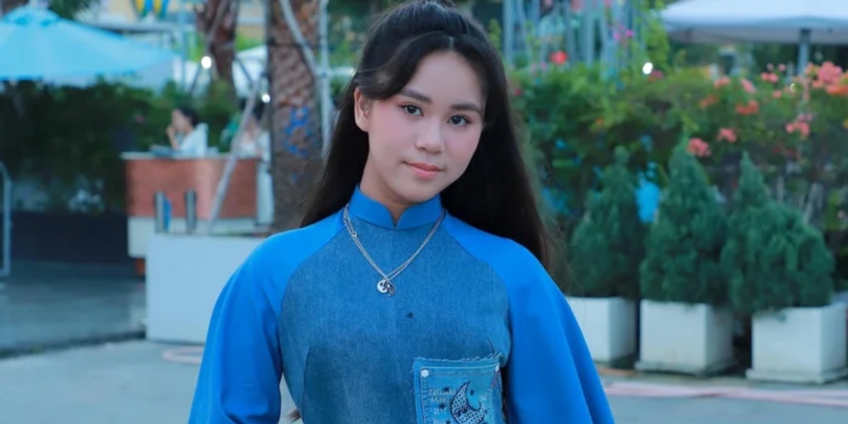 Hoa hậu nhí Bella Vũ diện áo dài tái chế từ 4 chiếc quần jeans cũ
